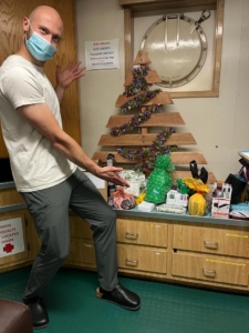 Andrew shows off the makeshift Christmas tree in the mess hall of the ship.